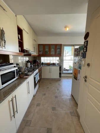 Venta Exclusiva: Piso de 2 Dormitorios con Vista a Plaza Lopez, Cochera y Amenities - Pasaje Storni 777, Rosario